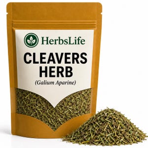 May include: A brown stand-up pouch containing dried Cleavers Herb, labeled with the HerbsLife logo and the text Cleavers Herb (Galium Aparine). A small pile of the green, shredded herbal plant matter sits in front of the sealed packaging.