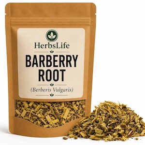 May include: A brown paper bag of barberry root with a clear window displaying the product. The label reads "HerbsLife BARBERRY ROOT (Berberis Vulgaris)". A pile of chopped barberry root is next to the bag.
