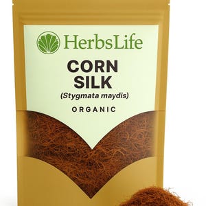 Könnte beinhalten: Eine goldfarbene Packung HerbsLife Corn Silk (Stygmata maydis) Organic. Die Packung hat ein weißes Etikett und ein grünes Logo. Die Packung enthält getrocknete, rötlich-braune Maisseide, mit einem kleinen Haufen davor.