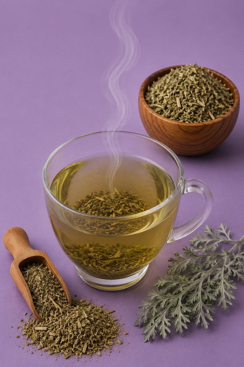 May include: A glass teacup with green tea and rising steam, alongside a wooden bowl and scoop filled with dried herbs. A sprig of green leaves rests on a purple surface. Herbal tea concept.