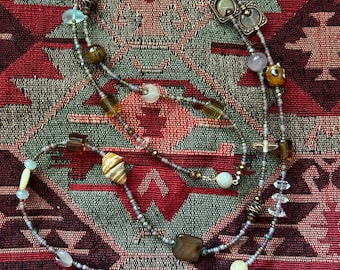 Beaded treasure necklace in earth tone