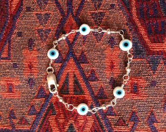 Light Blue/White Eyes and Sterling Silver Links Bracelet