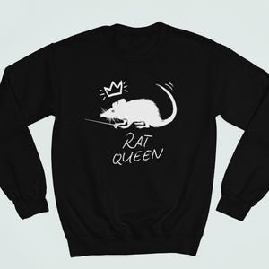 May include: Black sweatshirt with a white rat wearing a crown and the text "Rat Queen".
