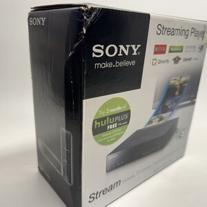 May include: A black Sony Streaming Player box with the text "Streaming Player" and "make.believe" on the front. The box shows a black streaming player device with a green Hulu Plus logo and the text "Try 2 months of Hulu Plus FREE".