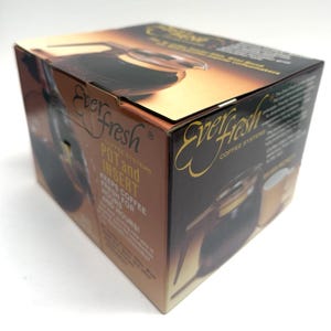 May include: A brown and gold Everfresh Coffee Systems box. The box features the words "Everfresh" and "Pot and Insert". The box also has an image of a coffee maker. The box is on a white surface.