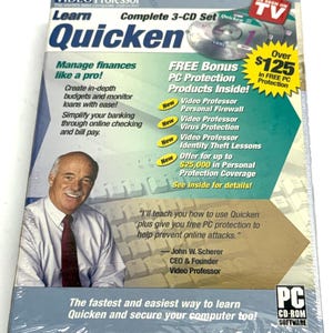 May include: A sealed box set of "Video Professor Learn Quicken" software. The package includes 3 CDs and promises to help manage finances and secure your computer. Features a photo of a smiling man and the text "FREE Bonus PC Protection Products Inside!"
