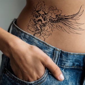 Skull-Angel Wing Tattoo, Gothic Tattoo Art, Black and White Ink Tattoo, Mystical Tattoo, Abstract Monochrome Tattoo, Dark Aesthetic Tattoo