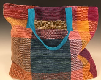Handwoven and handsewn reversible tote bag with colorful vintage fabric