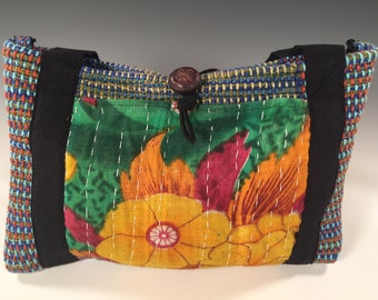 Handwoven handsewn handbag with kantha cloth exterior pockets