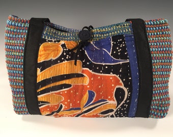 Handwoven handsewn handbag with kantha cloth exterior pockets