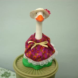 Summer outfit in pinkish purple background with multi colored flowers for 7" desk goose or office geese.