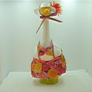 Goose clothes in summer bikini/bathing suit in gerbera daisies. Outfit fits Large 23-27&quot; lawn, garden or deck geese.