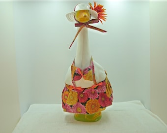 Goose clothes in summer bikini/bathing suit in gerbera daisies. Outfit fits Large 23-27" lawn, garden or deck geese.