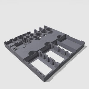 May include: A gray plastic organizer with multiple compartments and slots. The organizer has the word "Dice" printed on the side.