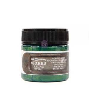 May include: A small jar of green acrylic paint with a metallic sheen. The label reads "art alchemy SPARKS 1.7 FL. OZ. (50 ml) ACRYLIC PAINT PEINTURE À L'ACRYLIQUE PINTURA ACRÍLICA Green Goblin Bouffon Vert Duende Verde".