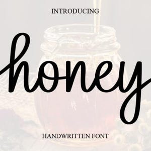 May include: A clear glass jar filled with honey, with a wooden dipper. The word "honey" is written in a large, black, cursive font. The text "INTRODUCING" and "HANDWRITTEN FONT" are above and below the word "honey".