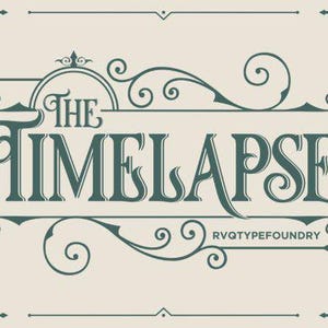 May include: An elegant design featuring the words "THE TIMELAPSE" in a teal, vintage-style font. The text is framed by decorative flourishes and borders on a cream background. The text "RVQTYPEFOUNDRY" is at the bottom.