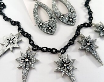 1950s style silver glitter starburst stars necklace with crystals