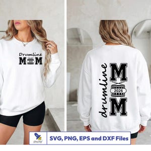May include: White sweatshirt with the text "Drumline Mom 2026" in black. The design includes a drum graphic. The back of the sweatshirt also features the text "Drumline Mom 2026".