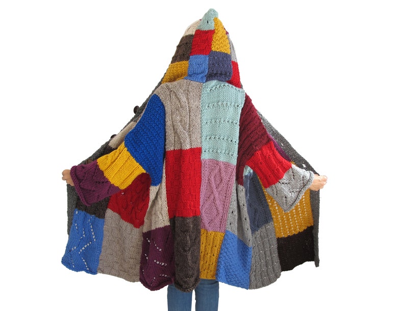 May include: A colorful patchwork cardigan with a hood. The cardigan is made of different colored yarn and has a variety of textures. The cardigan is a unique and stylish piece of clothing.