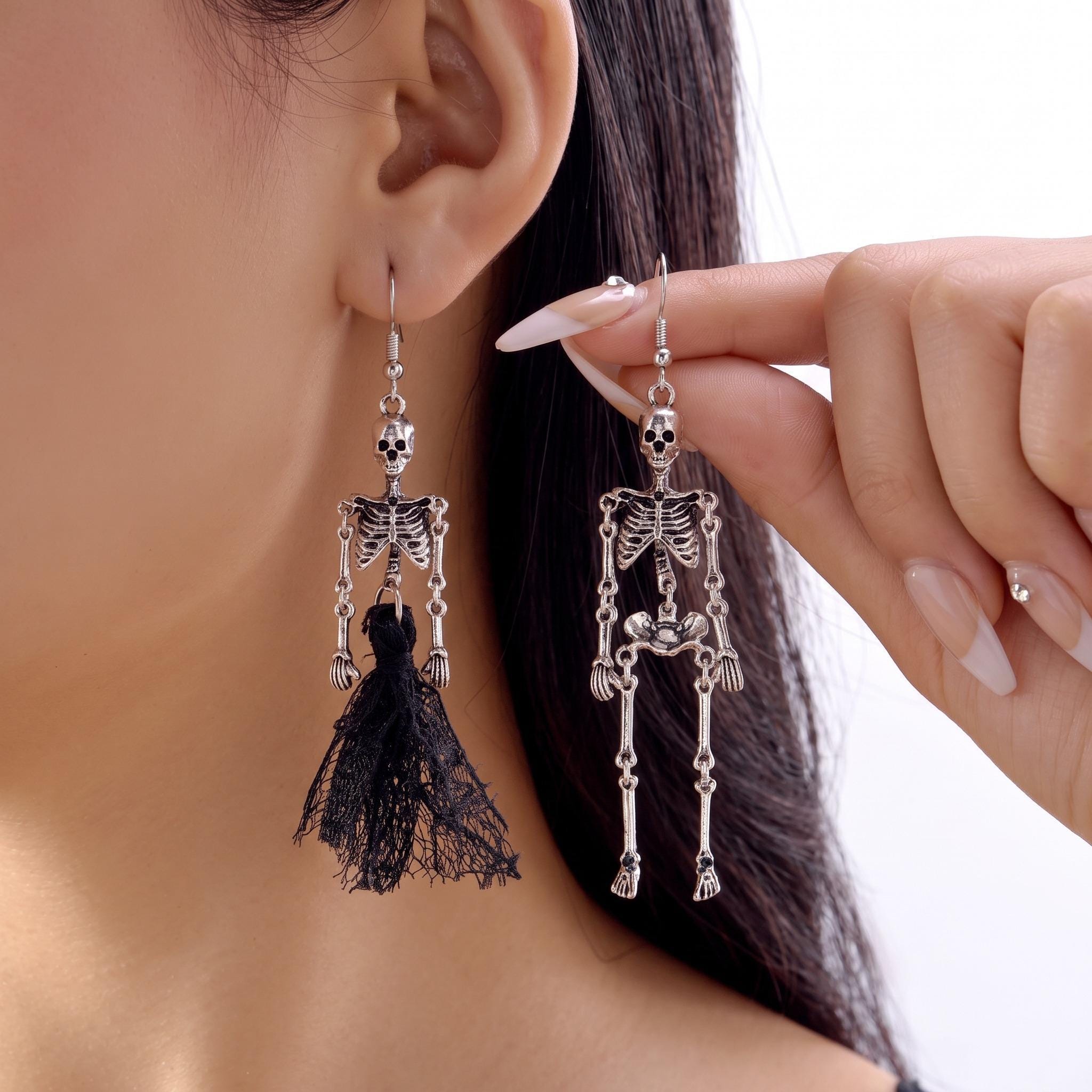 Vivienne westwood skeleton earrings - Etsy 日本