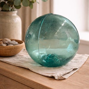 May include: A rustic wooden sign with the text "Welcome to our home" in a handwritten style. The sign features a distressed finish and a simple, inviting design, perfect for entryway decor.