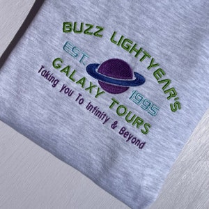 Buzz Lightjahre bestickter Hoodie - Disney Galaxy Tour Sweatshirt