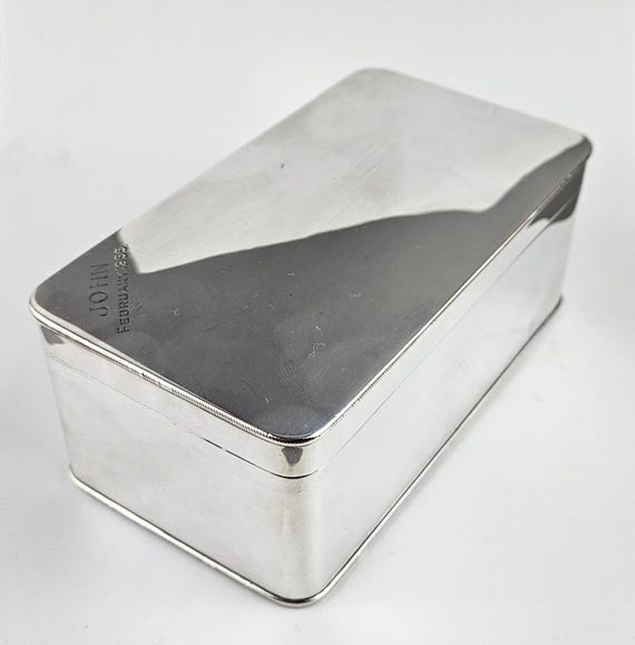 silver cigarette box with hinged lid Cigar or a and Engine Turned Border with a Plain A nice example of an