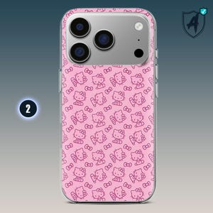 May include: Pink phone case featuring a repeating pattern of the Hello Kitty character in a darker pink. The case has a clear border and a silver camera housing. The number "2" is visible in a white circle on the left side.