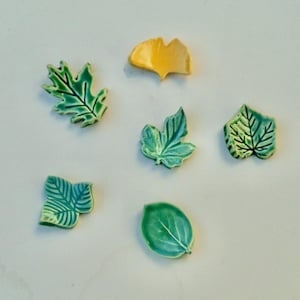 Set of Six Ceramic Knife/Chopstick rests, Pen Rests,Tea Spoon Holder, A variety of multi colored leaves