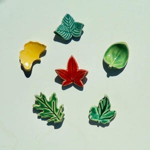 Set of Six Ceramic Knife/Chopstick rests, Pen Rests,Tea Spoon Holder, A variety of multi colored leaves
