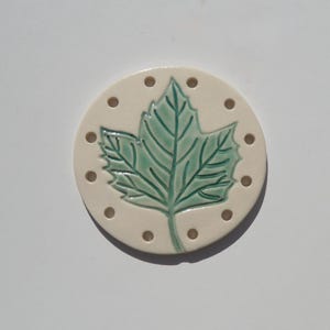 Ceramic centers for pine needle baskets, Hand Built and Hand Painted Leaf Design