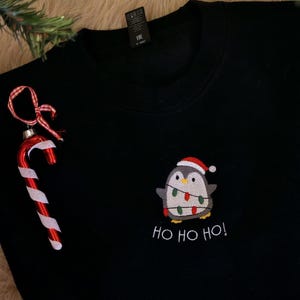 Bestickter Weihnachtspullover mit Pinguin Motiv für Damen und Herren