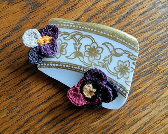 Crockery and crochet brooch