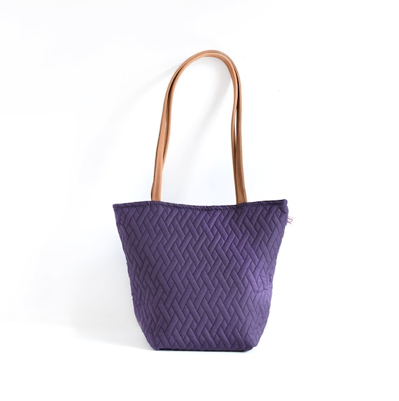 Items similar to Purple quilted fabric tote bag with leather handles