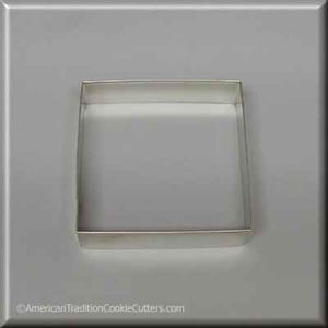 May include: A silver metal square cookie cutter.