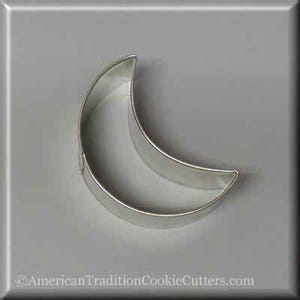 May include: A silver metal crescent moon cookie cutter.