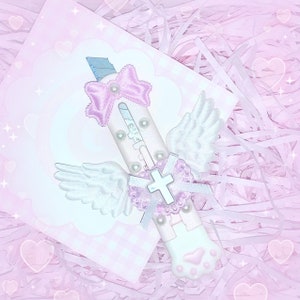 Cuchillo utilitario decorativo kawaii con forma de cinta de ángel