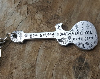 Custom guitar bottle opener keychain. Can be done with lyrics or saying of your choice