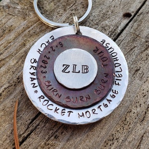 Custom 3 tier metal keychains or necklaces. saying of your choice