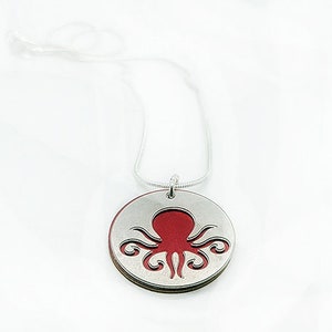 Double sided Octopus pendant of stainless steel and recycled aluminum