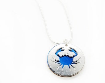Double sided  Crab pendant of stainless steel and recycled aluminum