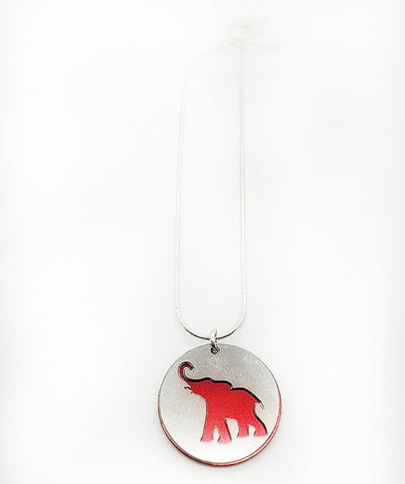 Double sided Elephant pendant of stainless steel and recycled aluminum