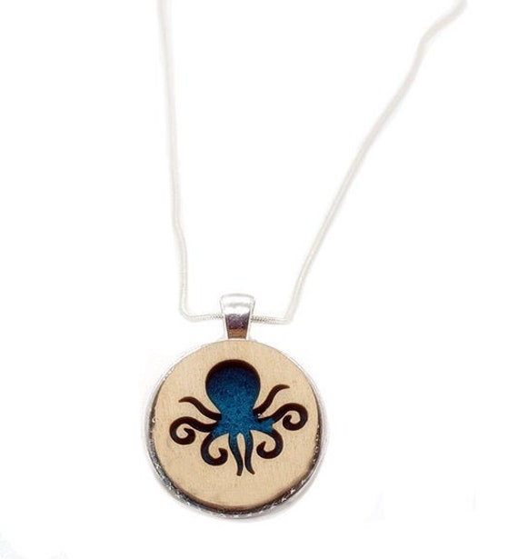 Octopus pendant of plywood and felt