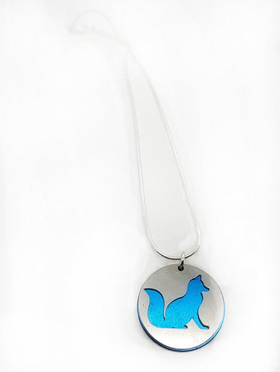 Double sided Fox pendant of stainless steel and recycled aluminum