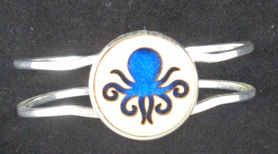 Octopus Cuff Bracelet from cut Plywood and Felt set into Hinged Stainless Steel setting