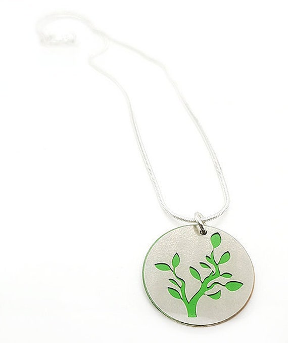 Double sided Branch pendant of stainless steel and recycled aluminum