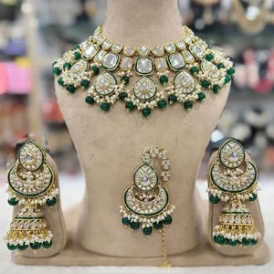 Necklace set with earrings and tikka