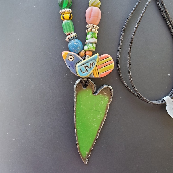 Adjustable Necklace with a Reversible Bird Pendant and a Green Heart