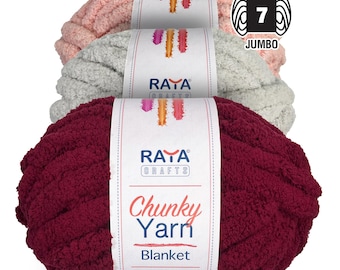 May include: Three skeins of Raya Crafts jumbo weight 7 chunky yarn stacked vertically. The top skein is light pink, the middle is light gray, and the bottom is deep burgundy. Each skein features a white paper label with the brand name and text.
